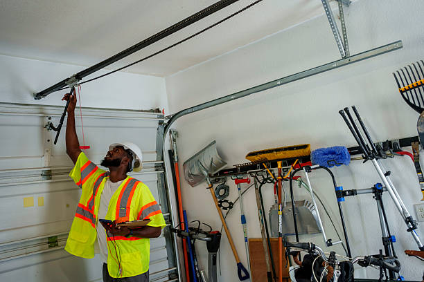 Professional Garage Door Panel Replacement technician working in Washburn, WI